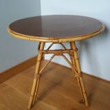 Round coffee table in wicker and bamboo