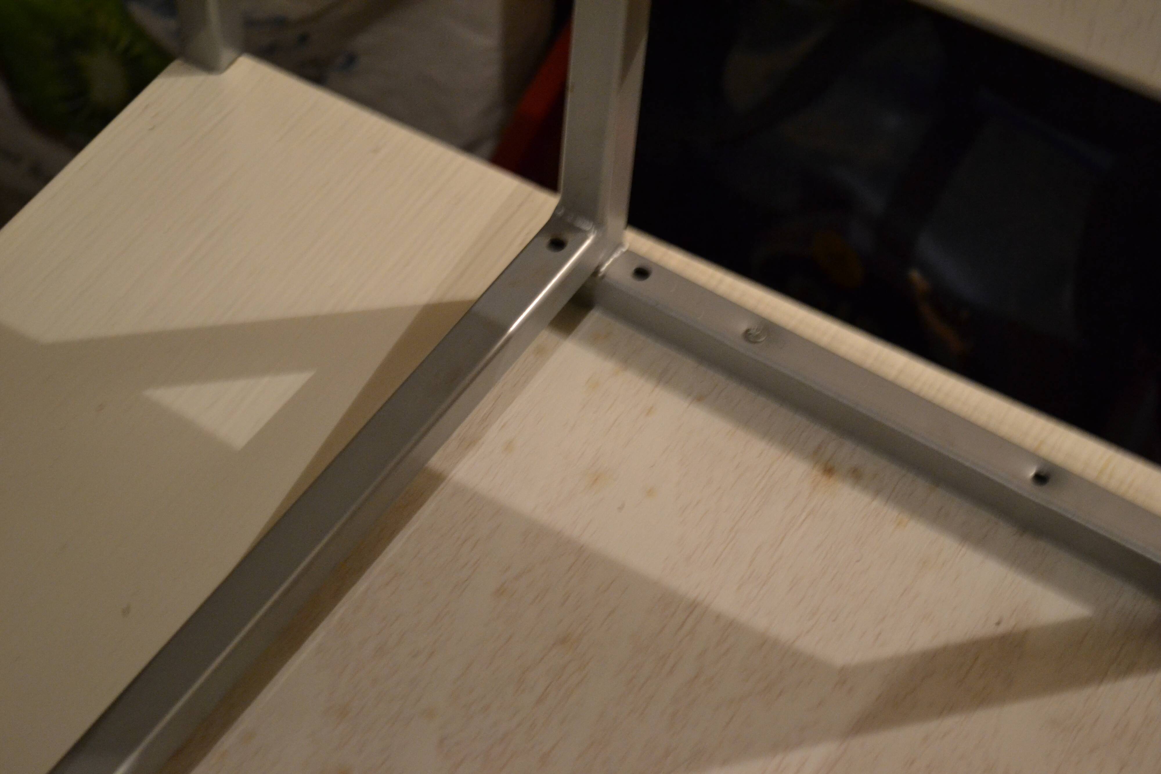 Set of 4 vintage metal and wood chairs from the 1990s.