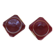 Pair of burgundy ceramic coasters or bottles with gold trim