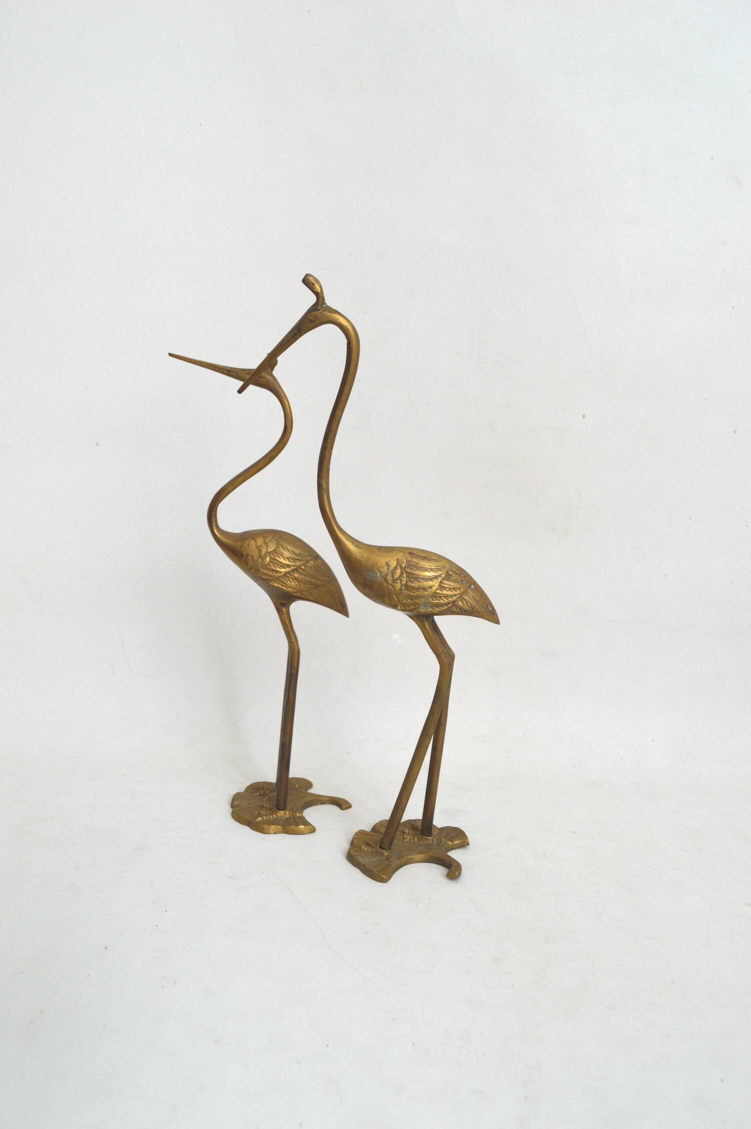 Couple of brass birds