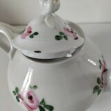 Porcelain teapot with rose patterns