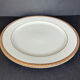 2 assiettes de présentation en porcelaine