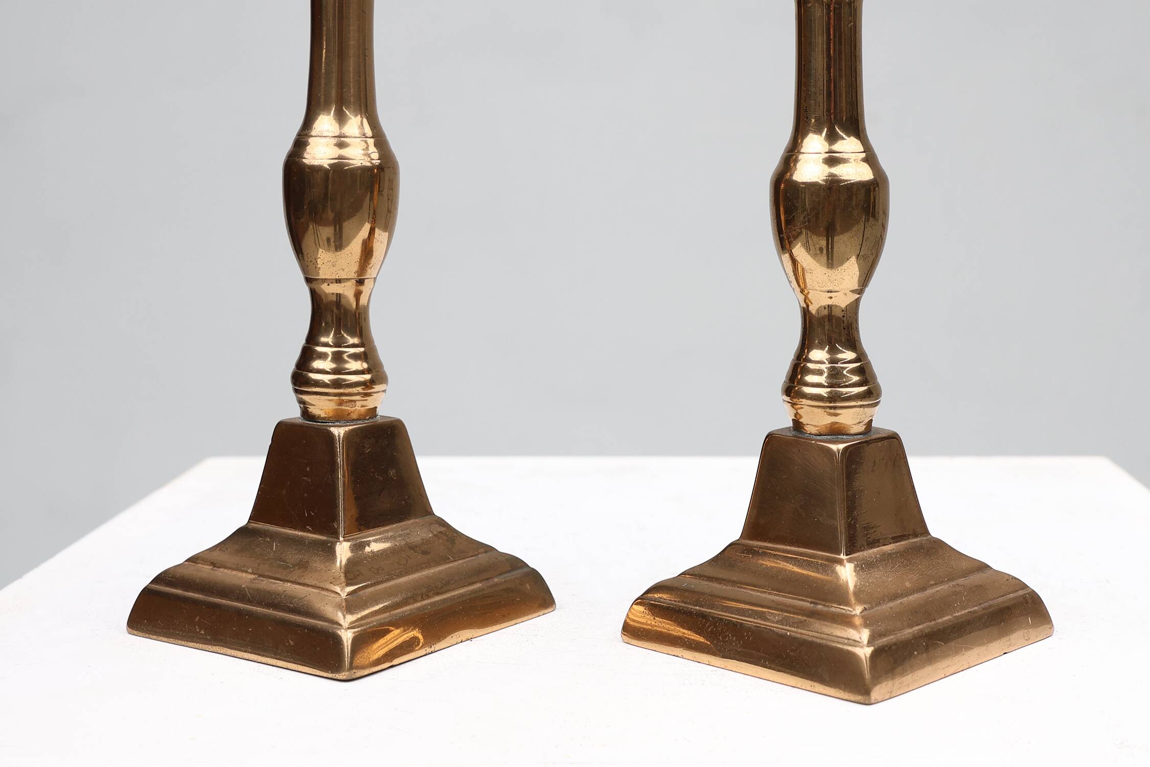 Pair of two French antique candlesticks in bronze, ca. 1890