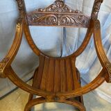 Siège, fauteuil Dagobert curule en noyer sculpté style Renaissance