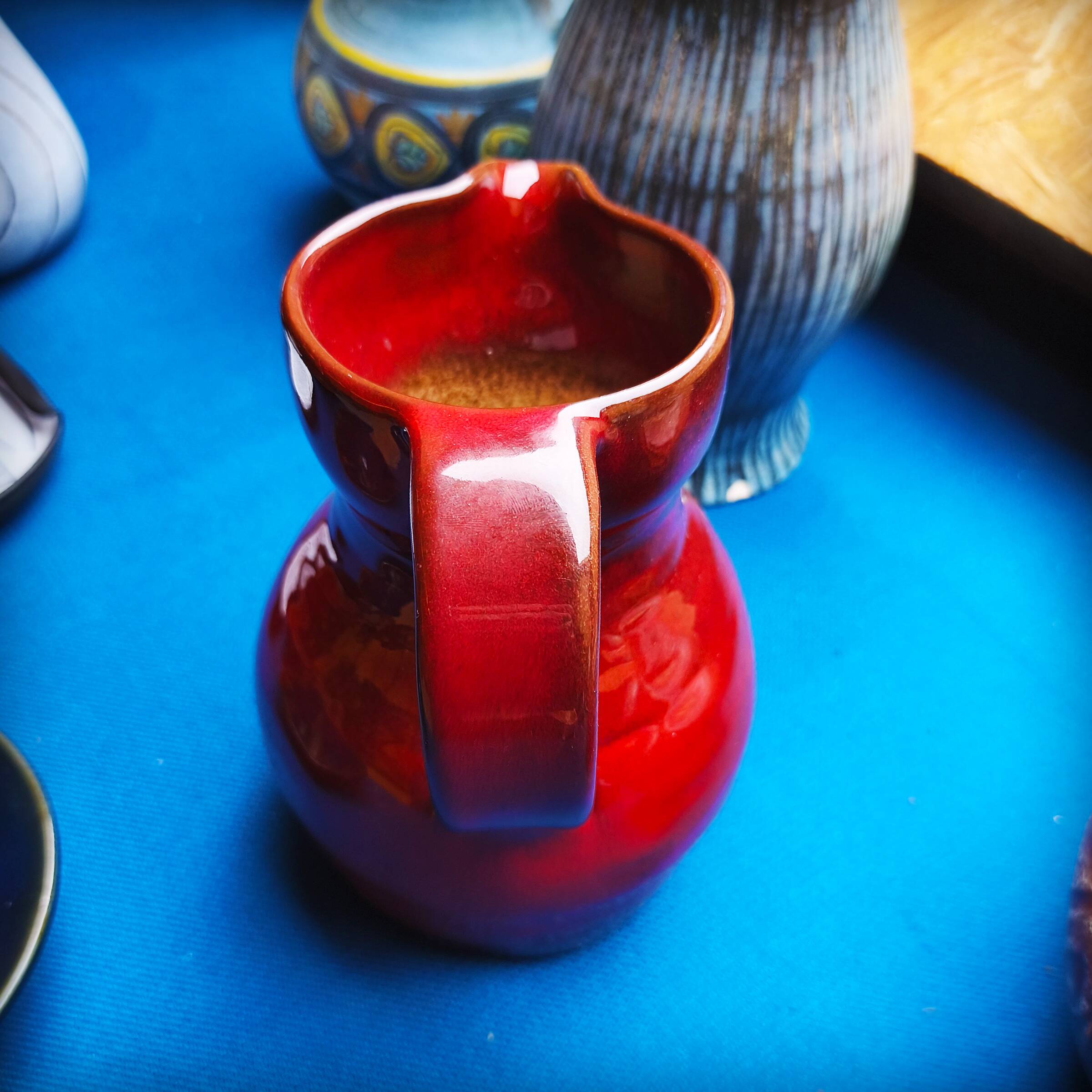 Max Idlas, large burgundy ceramic pitcher, France, 1960s