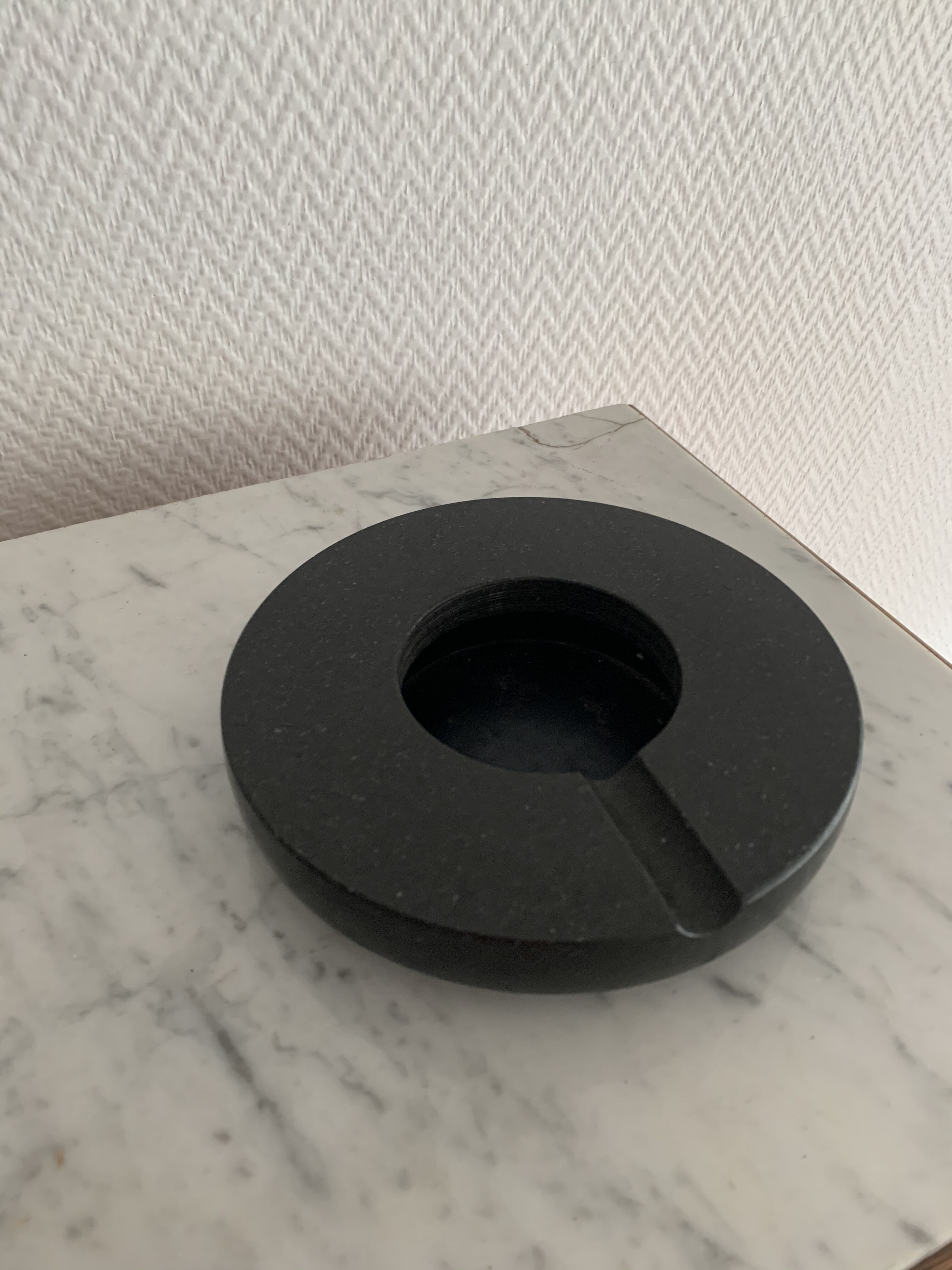 Grey-grey and black speckled marble round ashtray