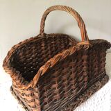 Log basket near fireplace