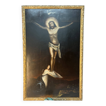 Beautiful religious work from the 17th century, oil on panel representing Christ on his cross with Mary Magdalene at his feet