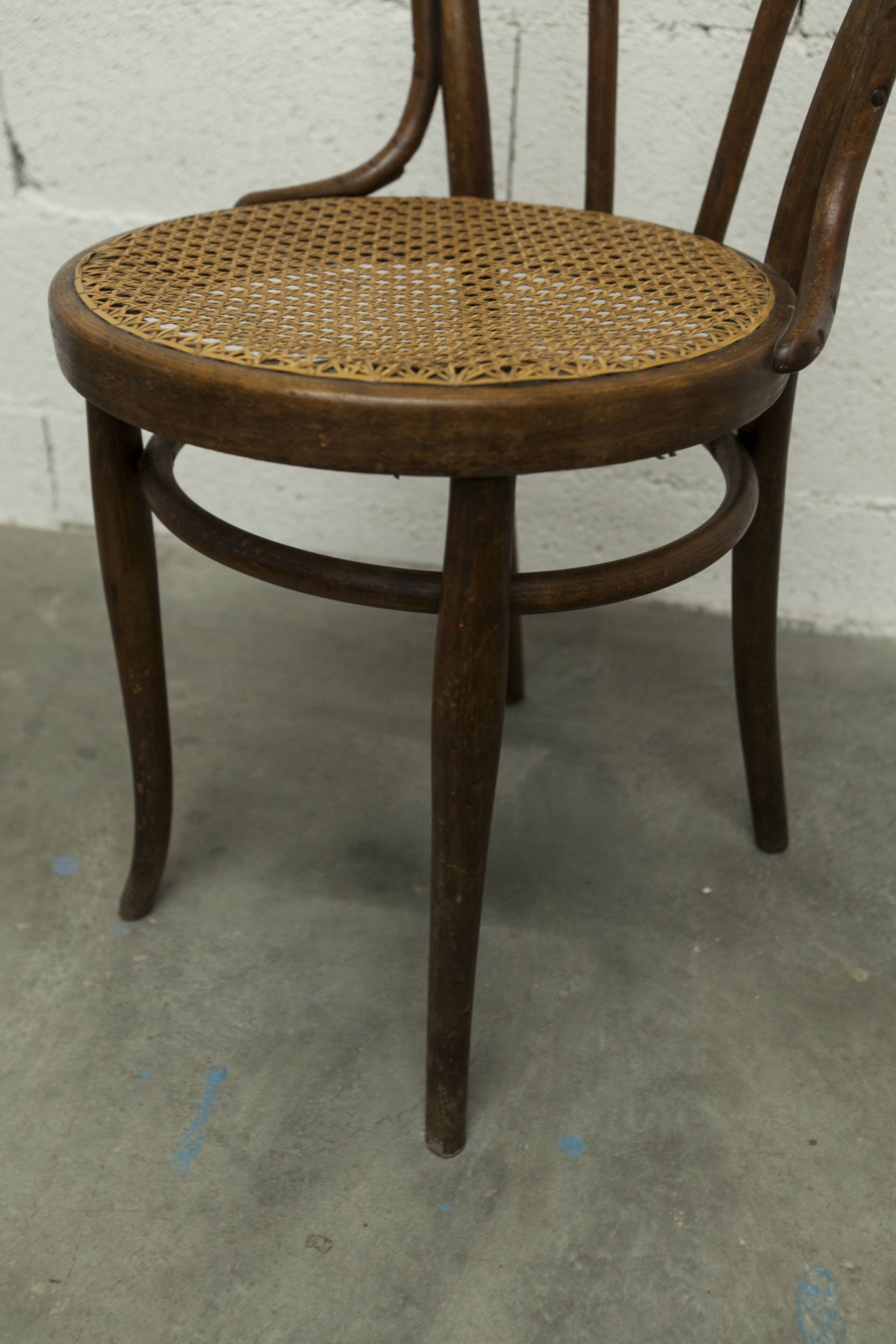 1920s curved wooden cane bistro chair