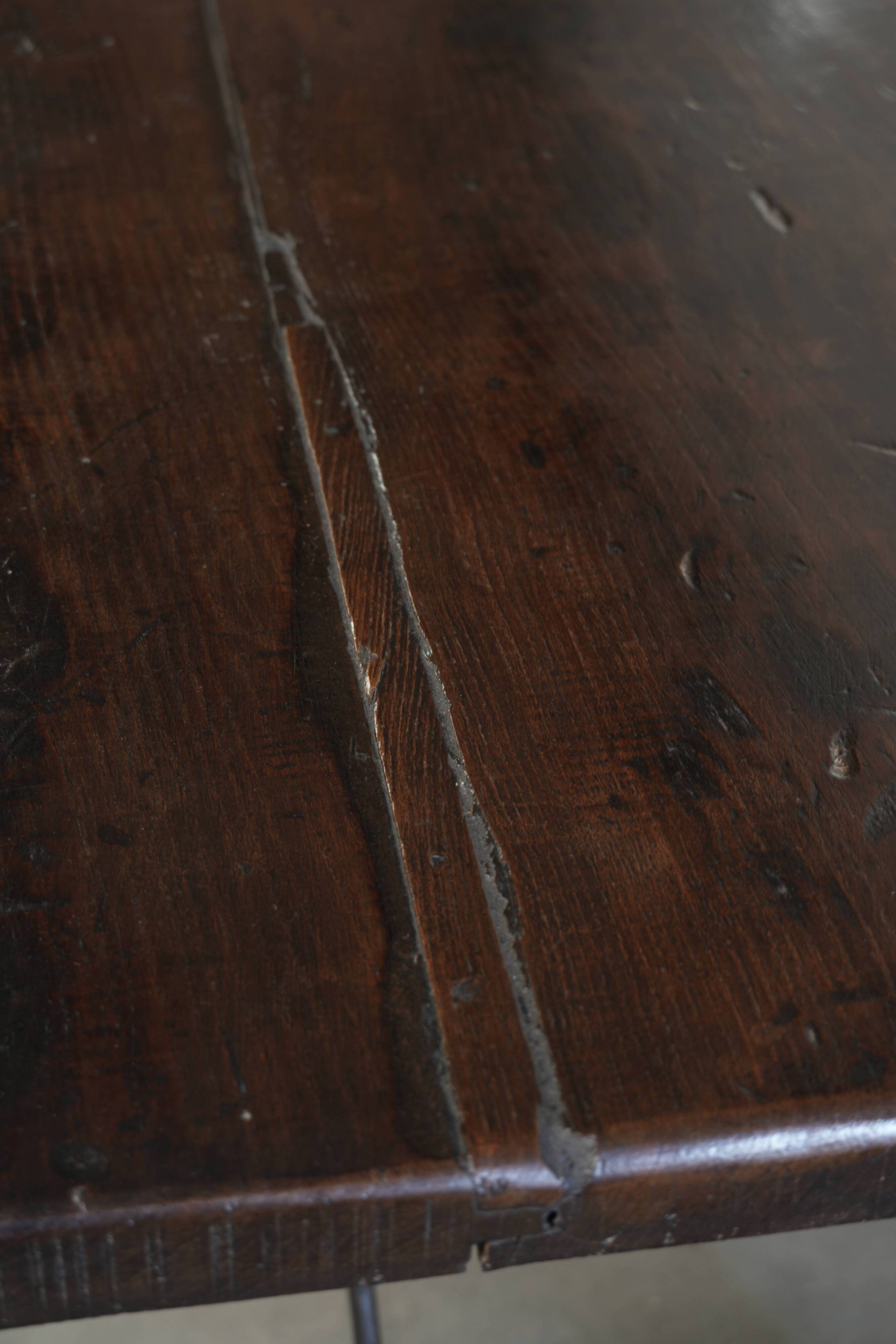 Antique Spanish table from the early 18th century with  a cast iron base