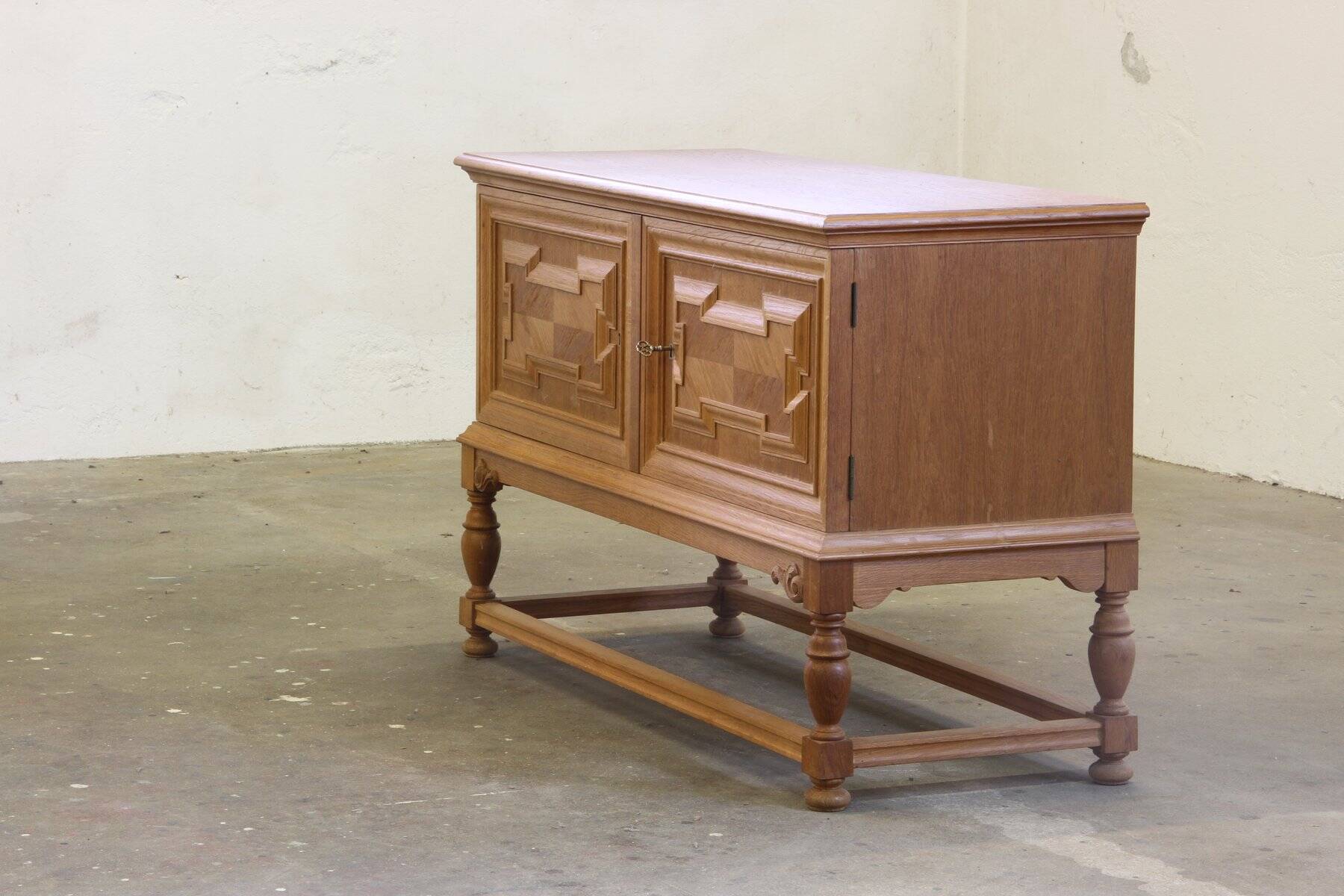 Vintage low sideboard in oak by Henning Kjærnulf, 1960s