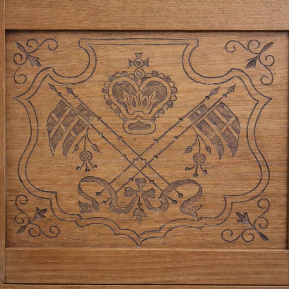Oak side cabinet with carved motifs