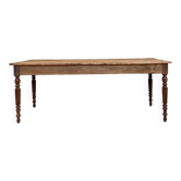 Table de ferme vintage aux pieds tournés.