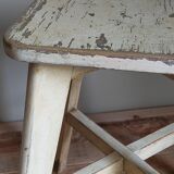 Old workshop stool in patinated solid wood