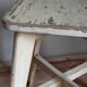 Old workshop stool in patinated solid wood