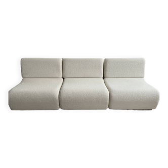 Cream white curled Rotondo sofa (The Socialite Family)