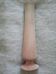 Tall vase in pink-beige carved stone