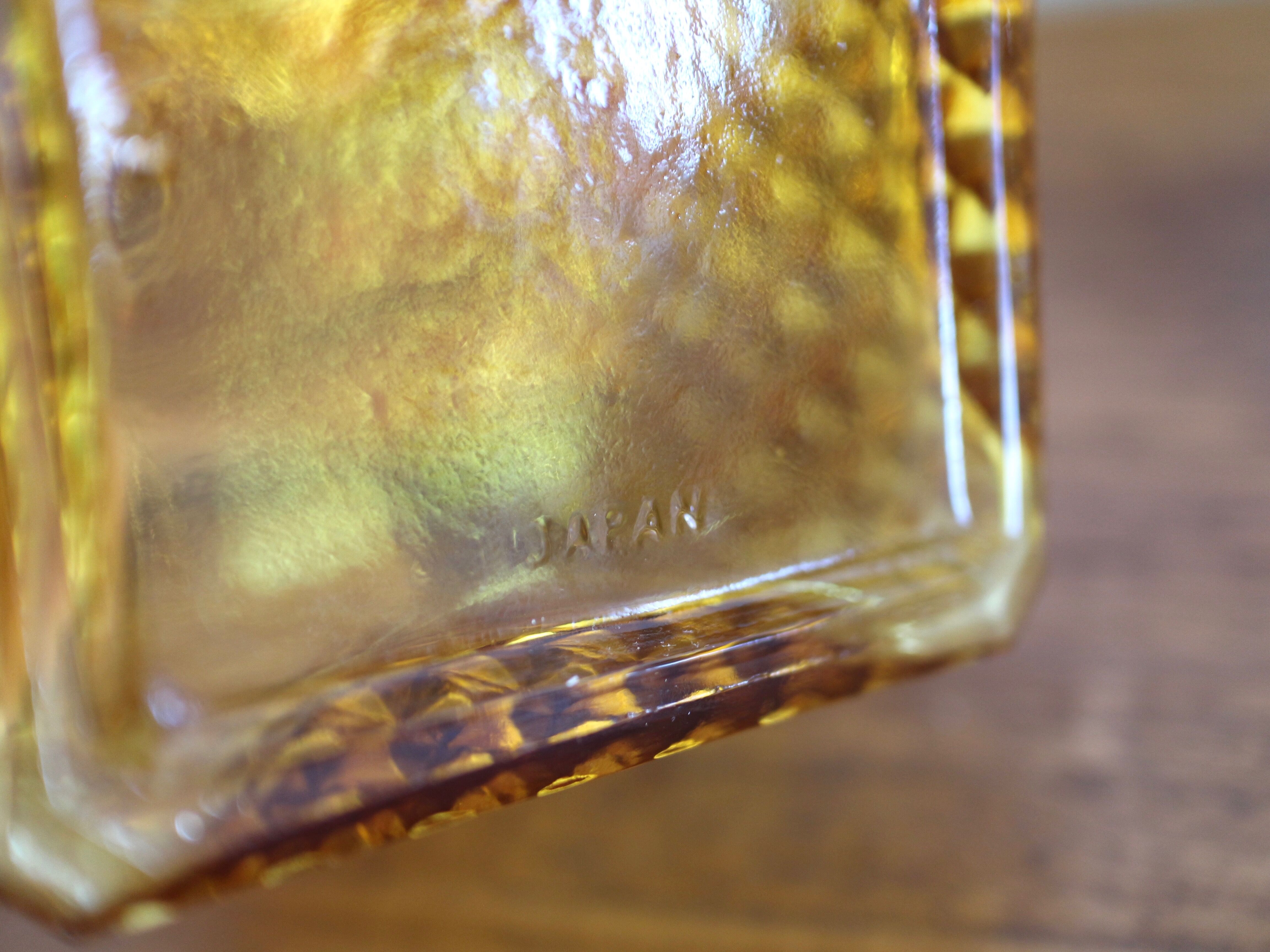 2 yellow glass whiskey carafes