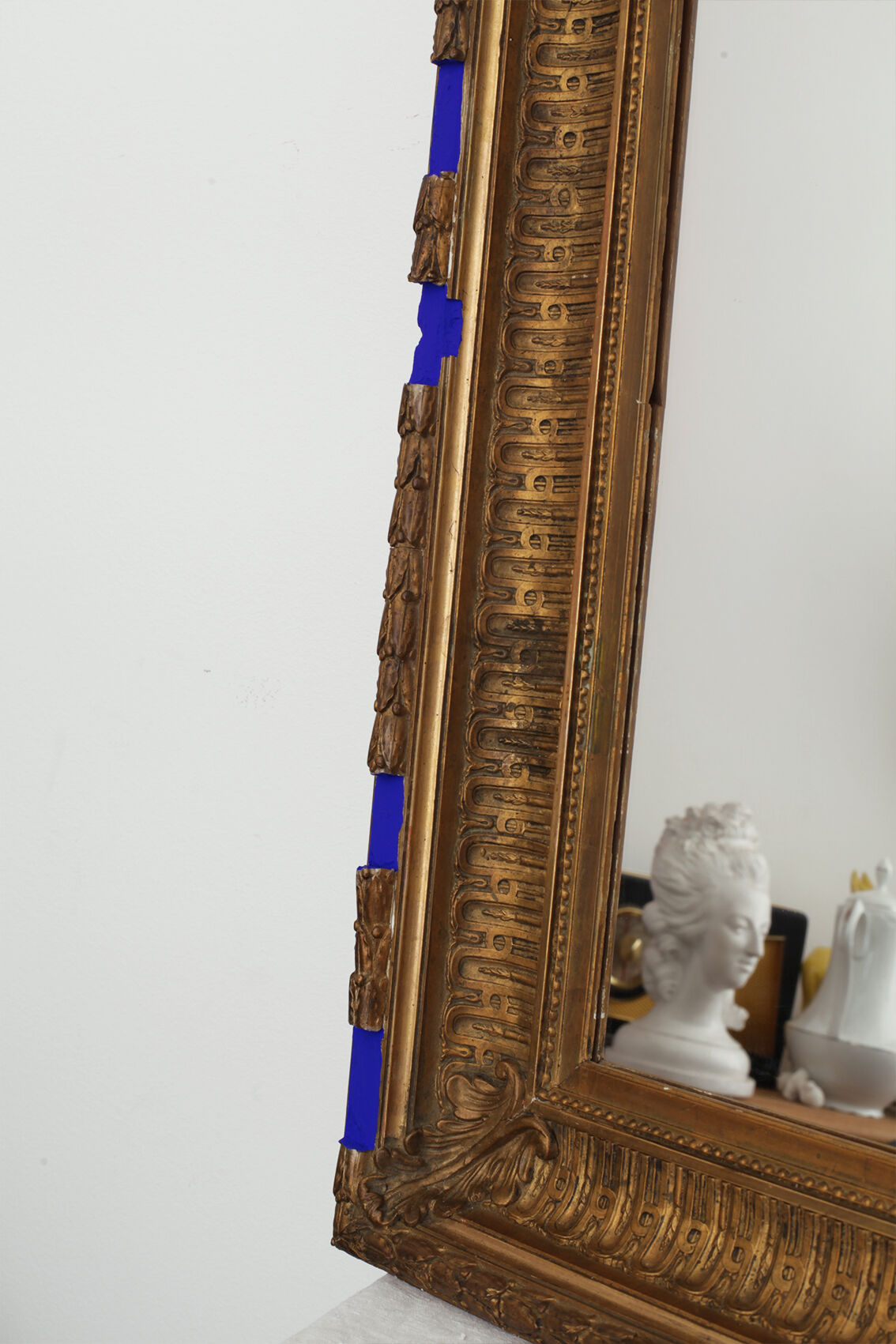 Golden antique mirror with leaf and bright king blue