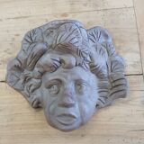 Child's face sculpture
