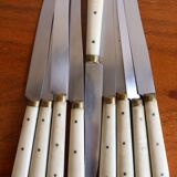 Set of 9 vintage cream table knives
