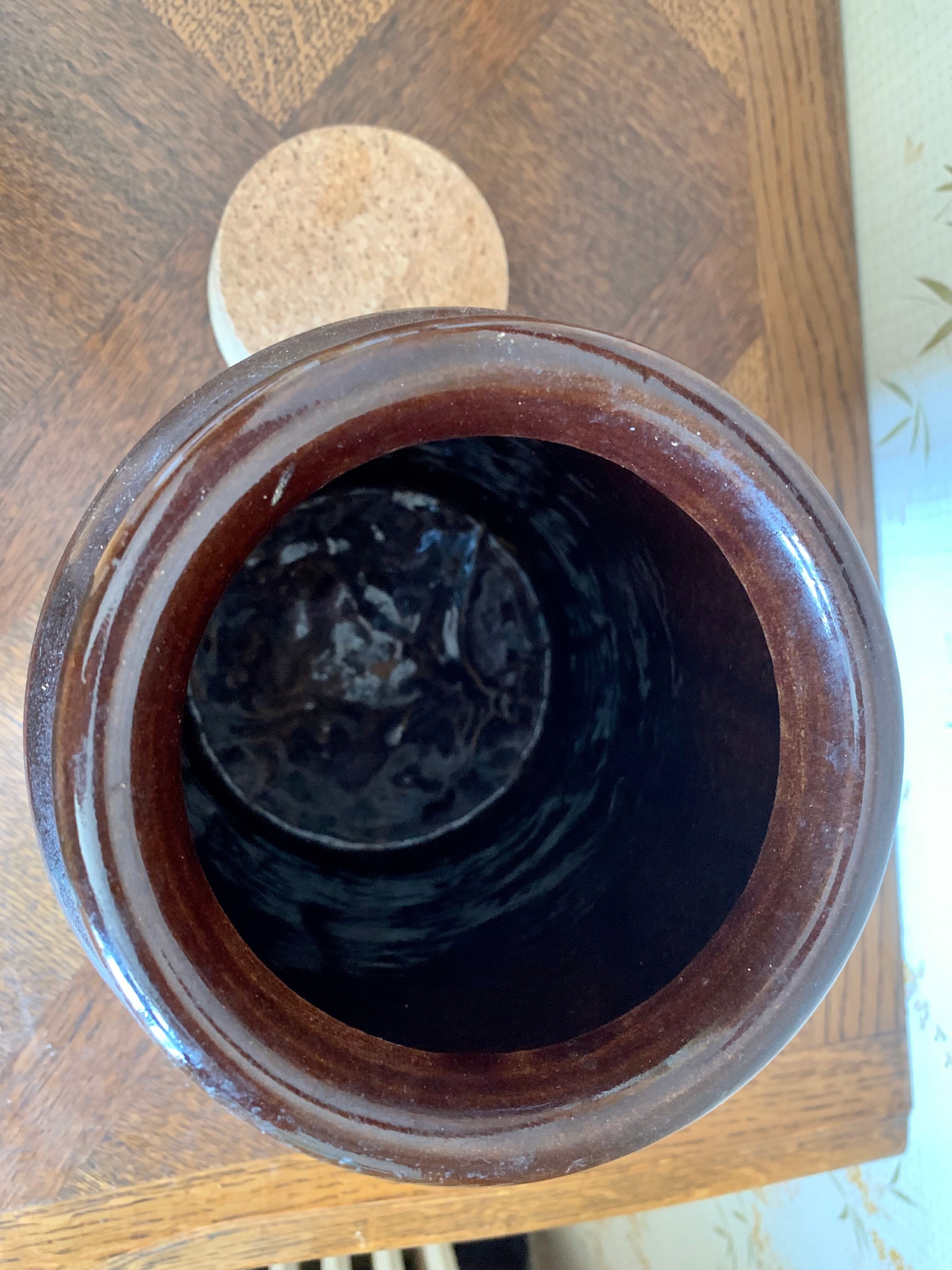 Old sandstone pot with cork lid