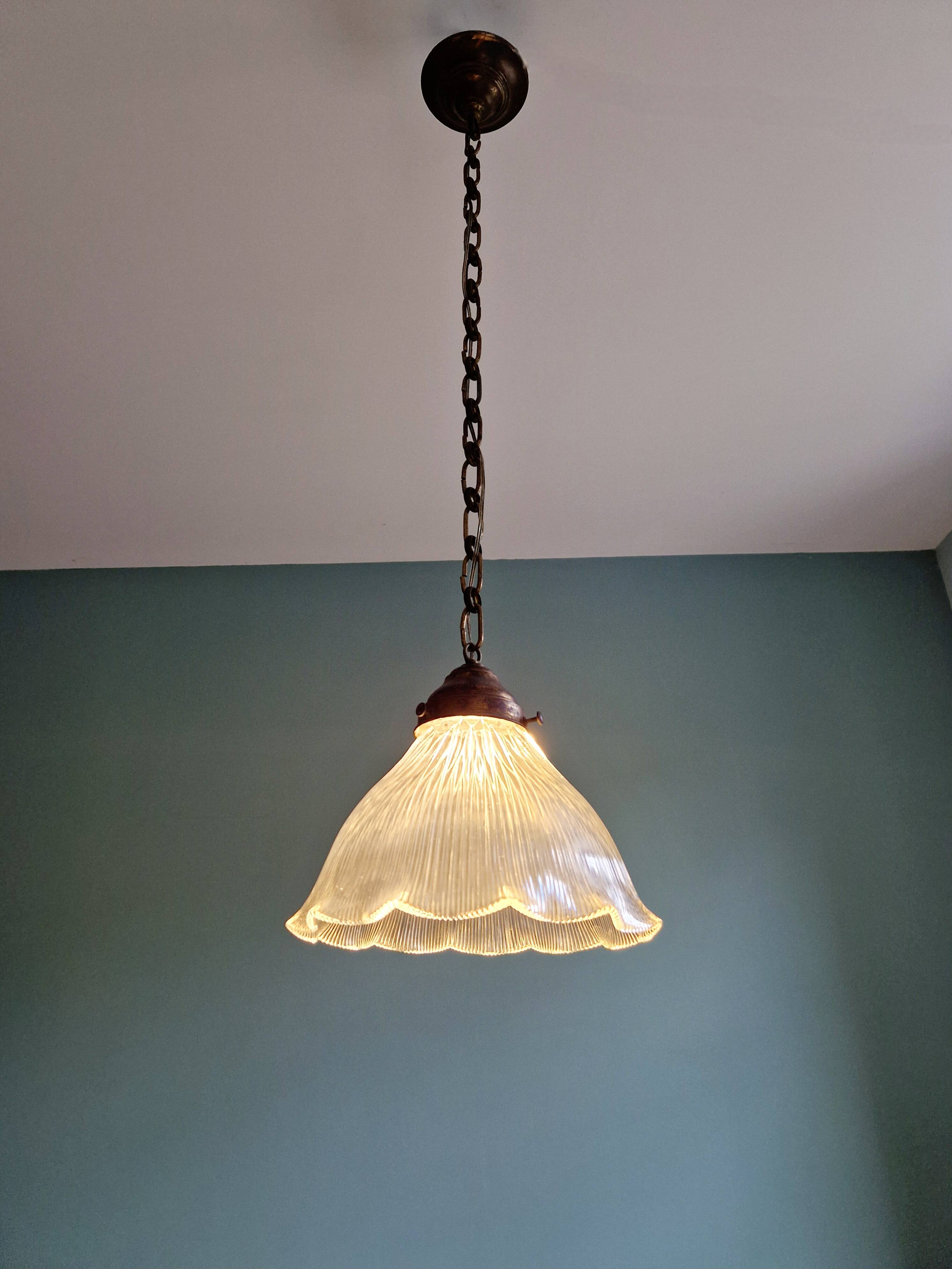 Large Holophane pendant light in transparent grooved glass
