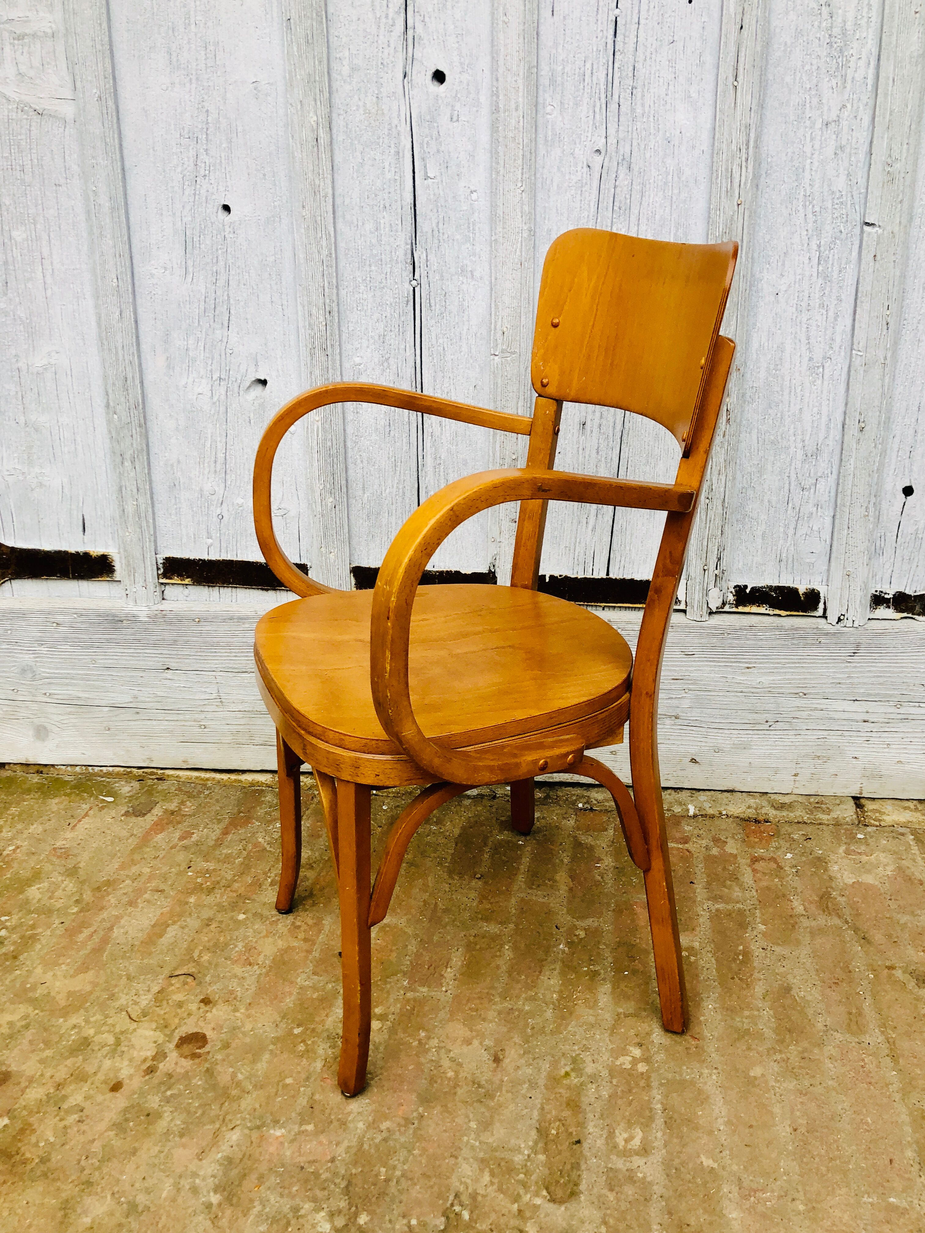 Baumann armchair curved wood armrests