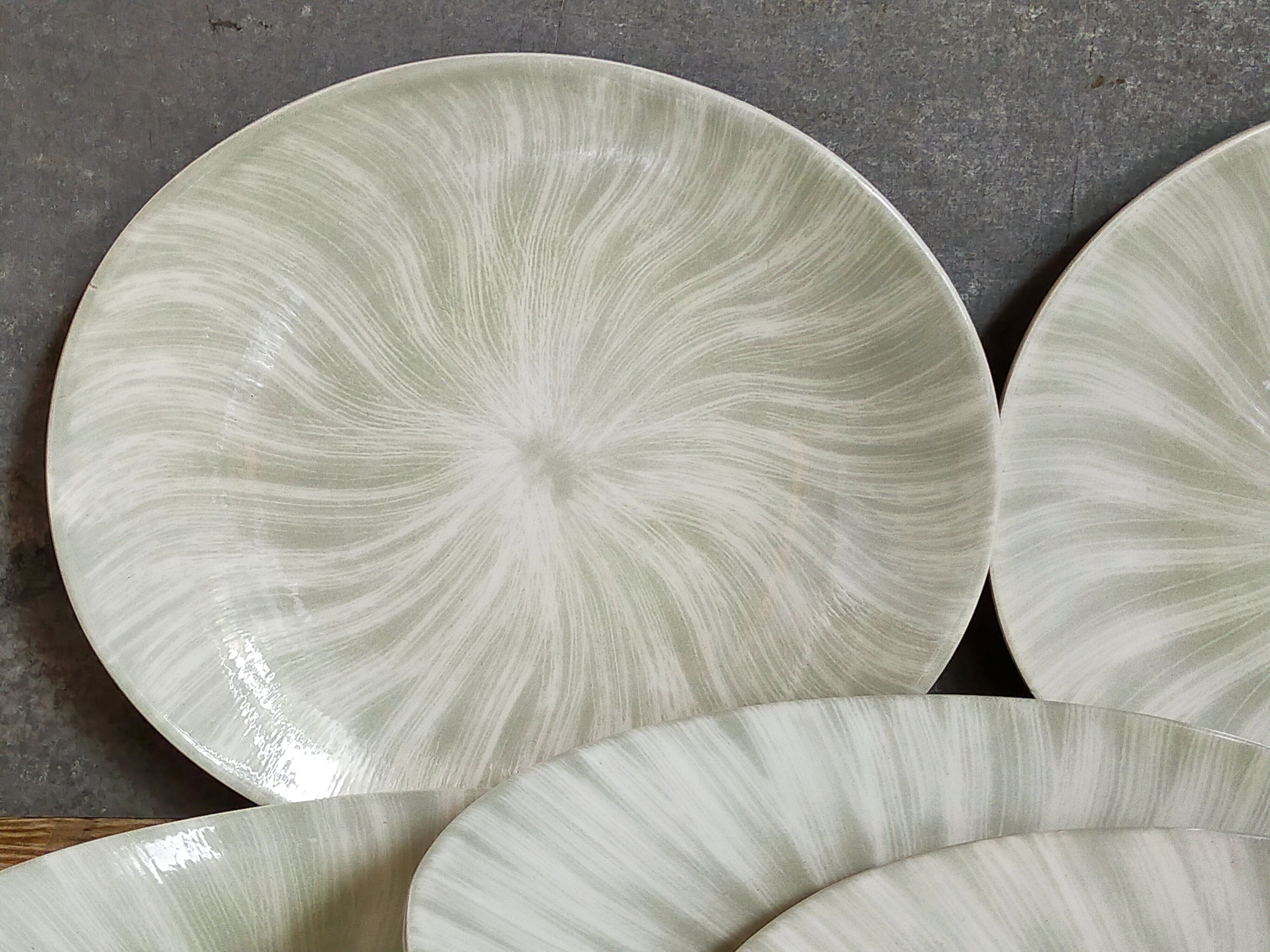 Nine earthenware plates from Salins-les-Bains vintage