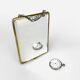 Old barber mirror in brass and beveled glass
