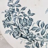 Plat de service rond terre de fer Badonviller modèle Jasmin motif fleuri papillon fin XIXème