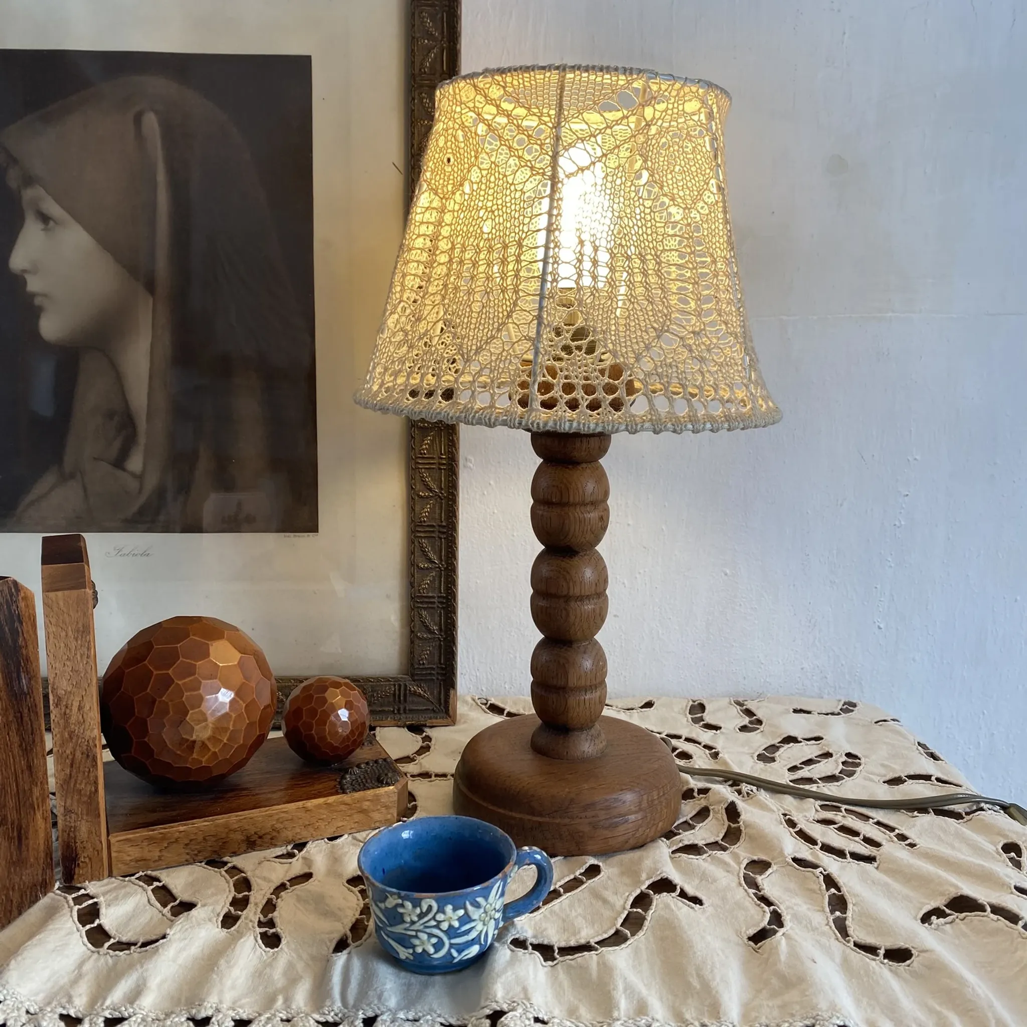 Wooden turned bedside lamp with lace
