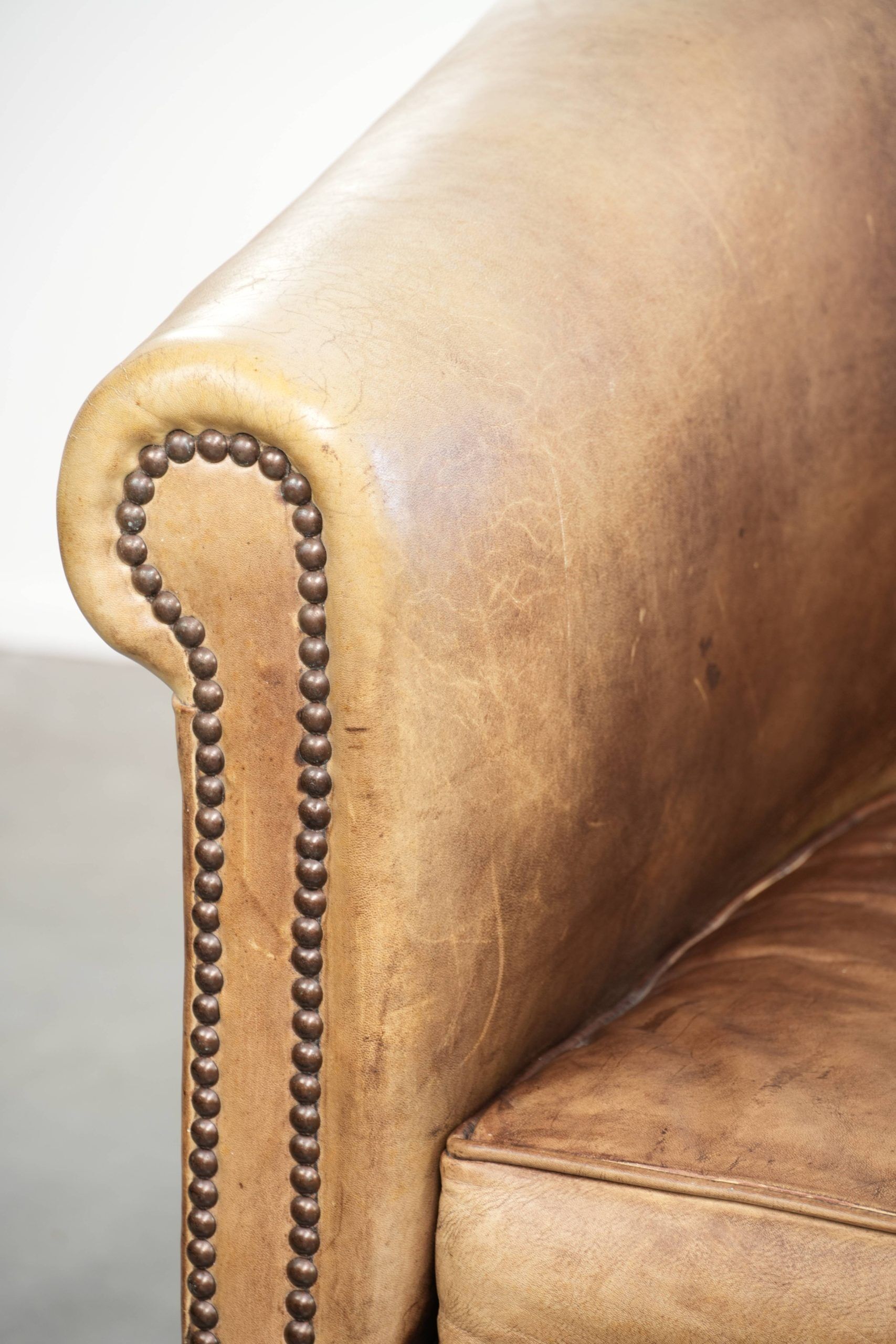 Set of two vintage cowhide club armchairs in English style