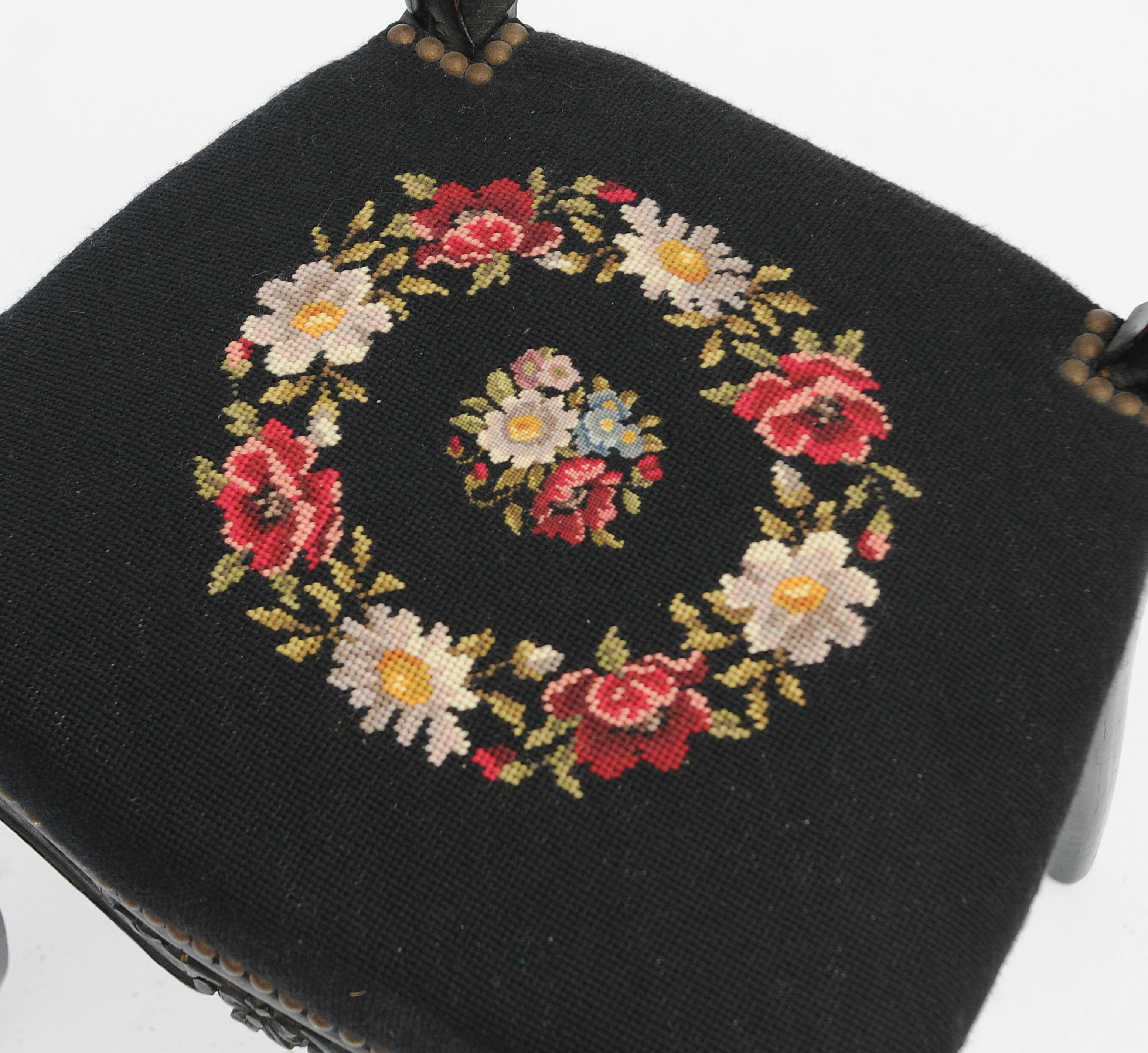 Pair of black Louis XV-style chairs