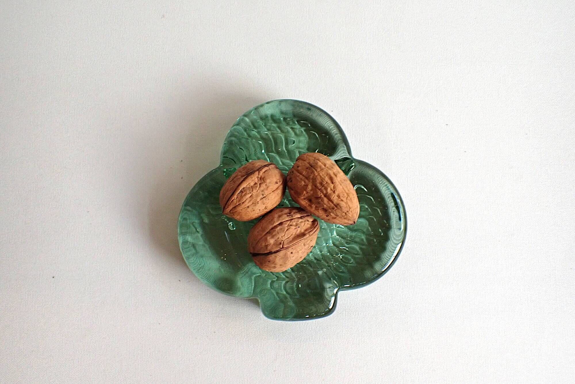 Vintage thick green glass aperitif bowl in the shape of a clover