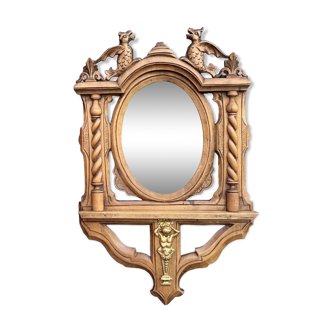 Antique “dragons” mirror in carved wood
