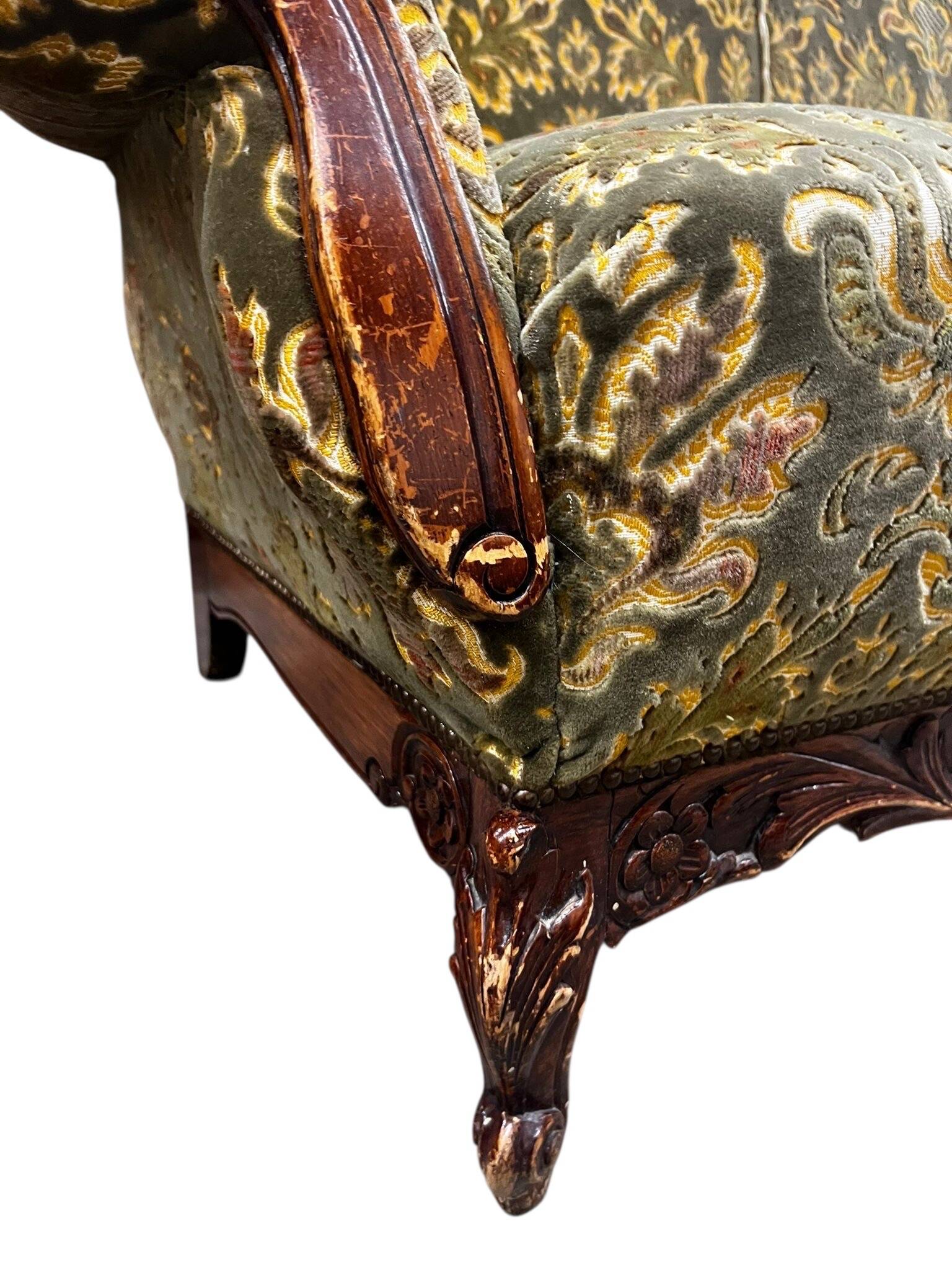 Vintage baroque chair with a rich floral pattern