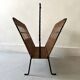 Porte revue en fer forgé noir et rotin dlg Raoul Guys, 1950