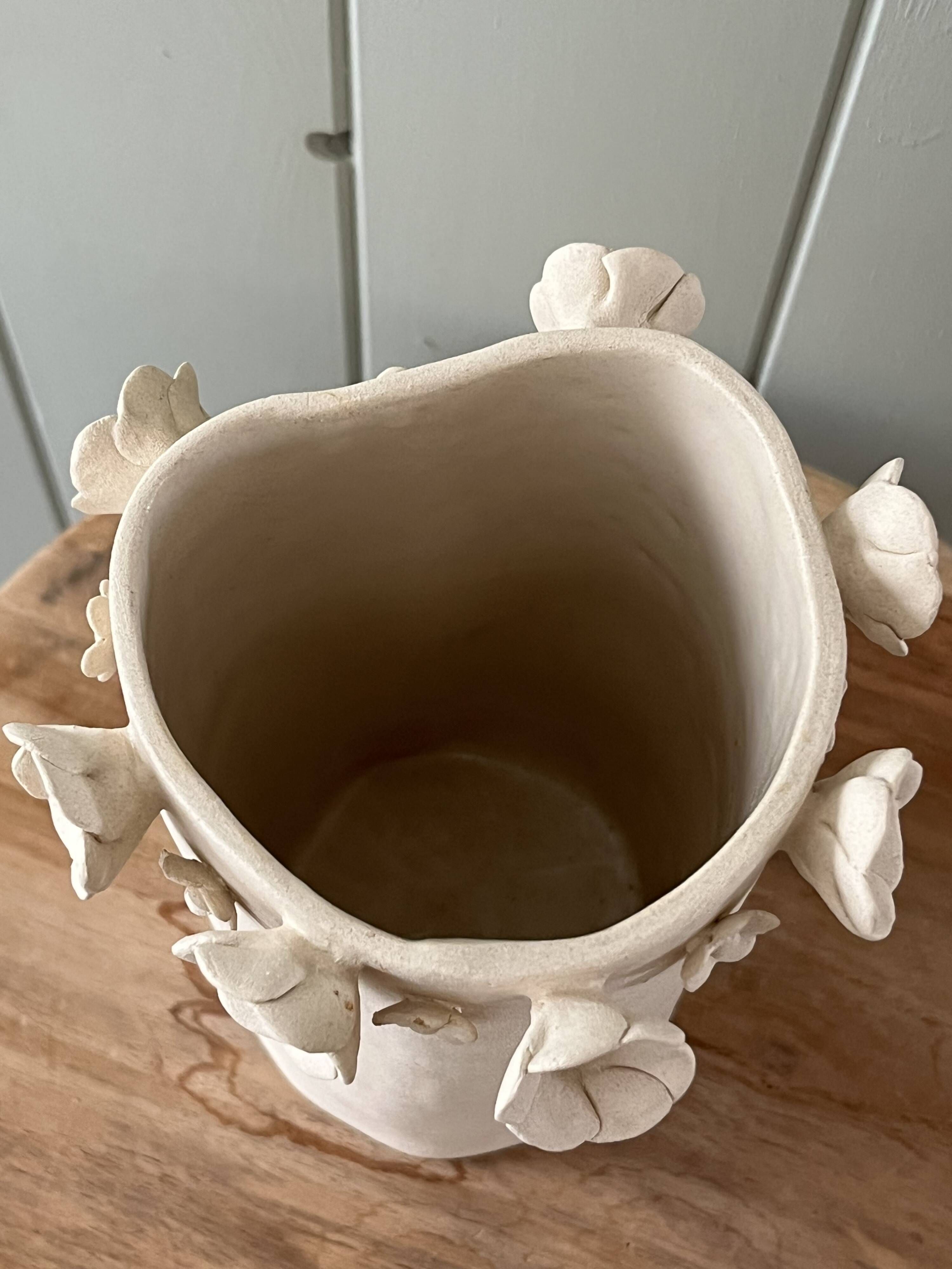 Stoneware vase with relief flowers