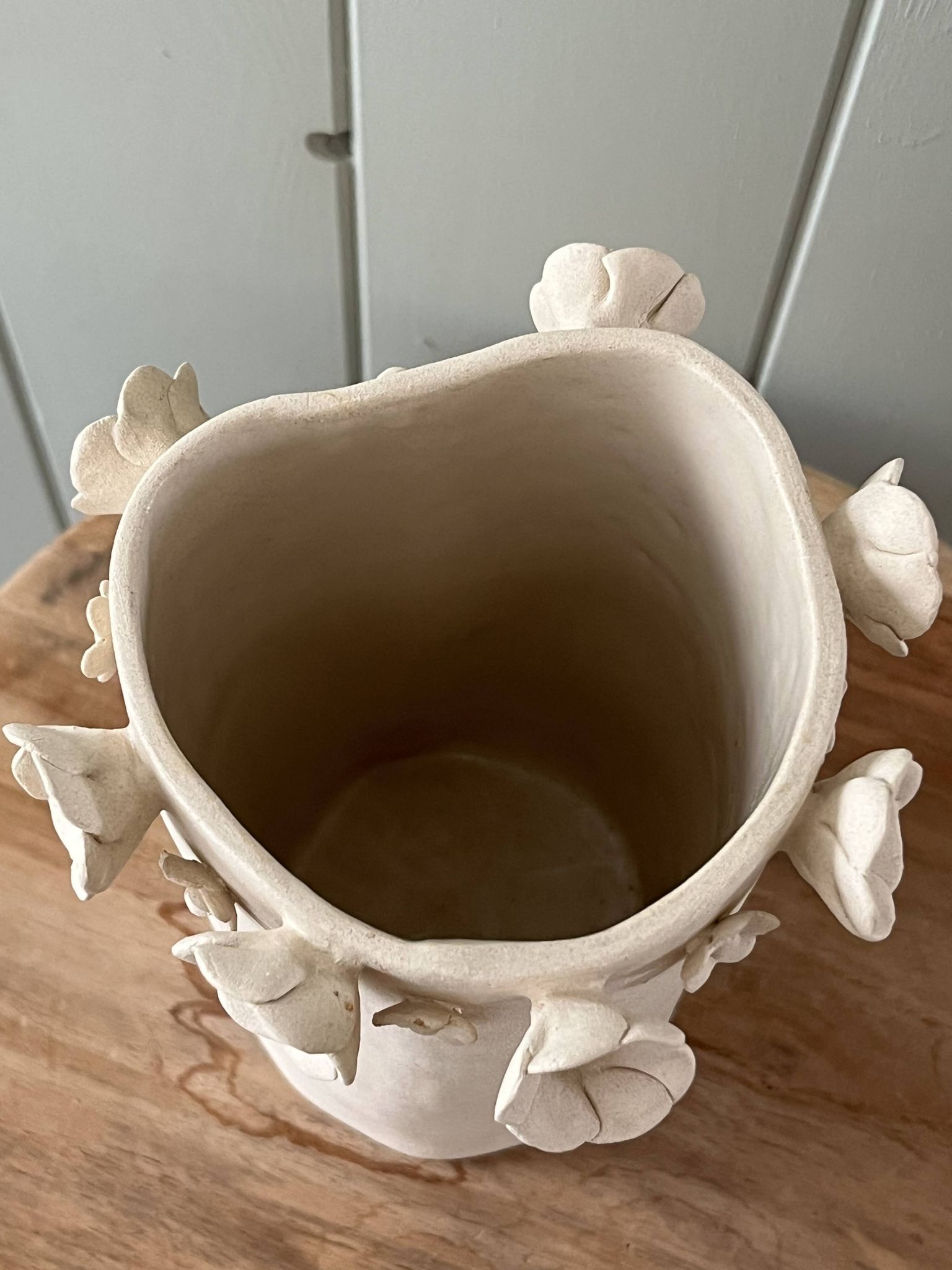 Stoneware vase with relief flowers