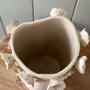 Stoneware vase with relief flowers