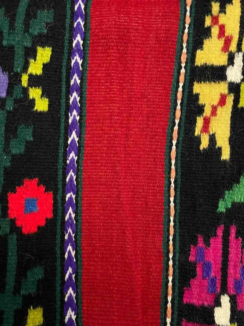 Romanian wool rug, red background with delicate colourful flowers