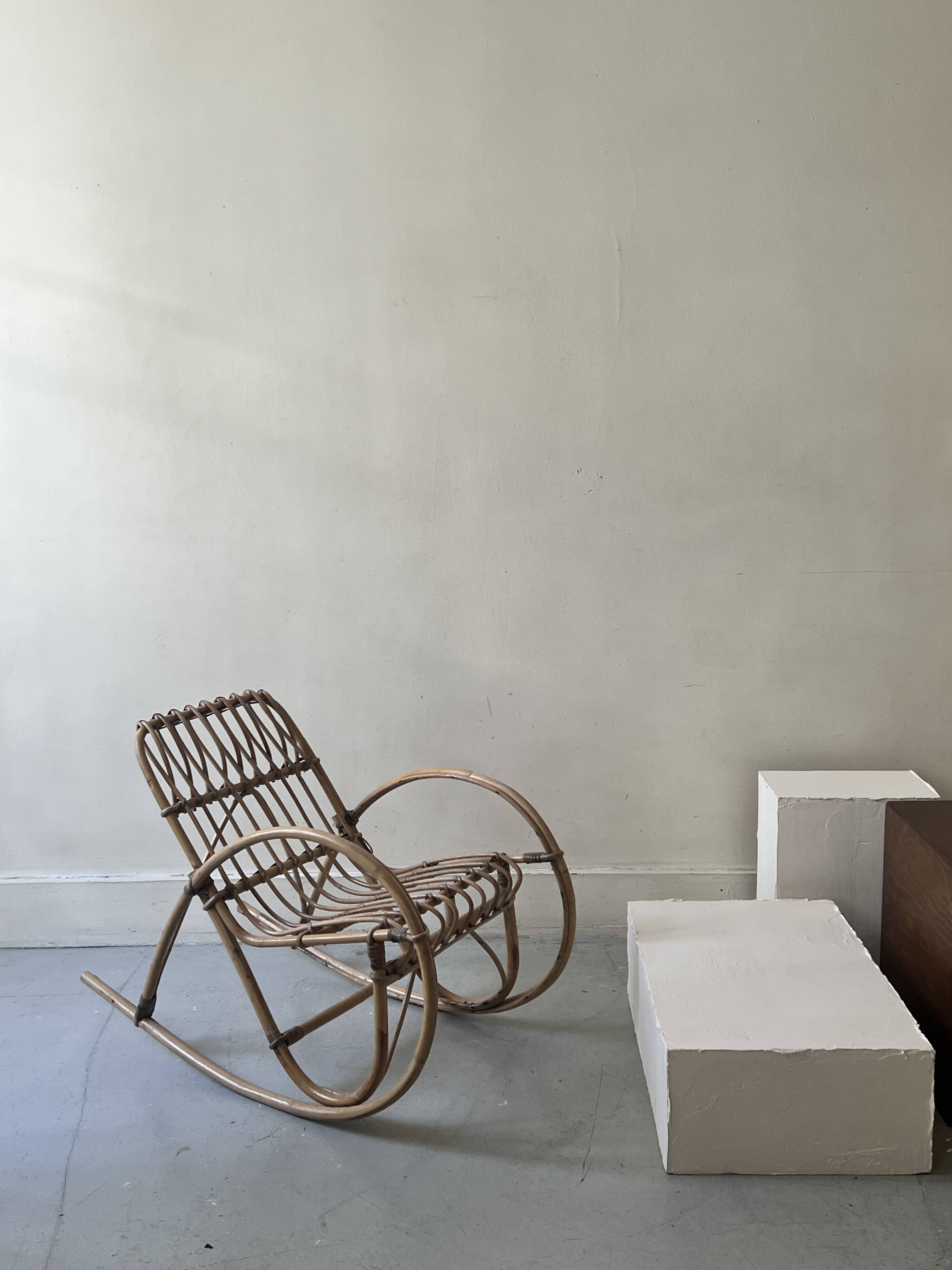 Child's rocking chair in rattan/bamboo, France 1950.