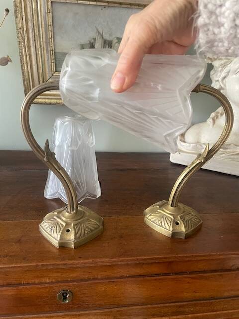 Pair of Art Deco wall sconces in frosted molded glass