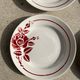 Set of 4 plates Sylvain Moulins des Loups burgundy rose decoration