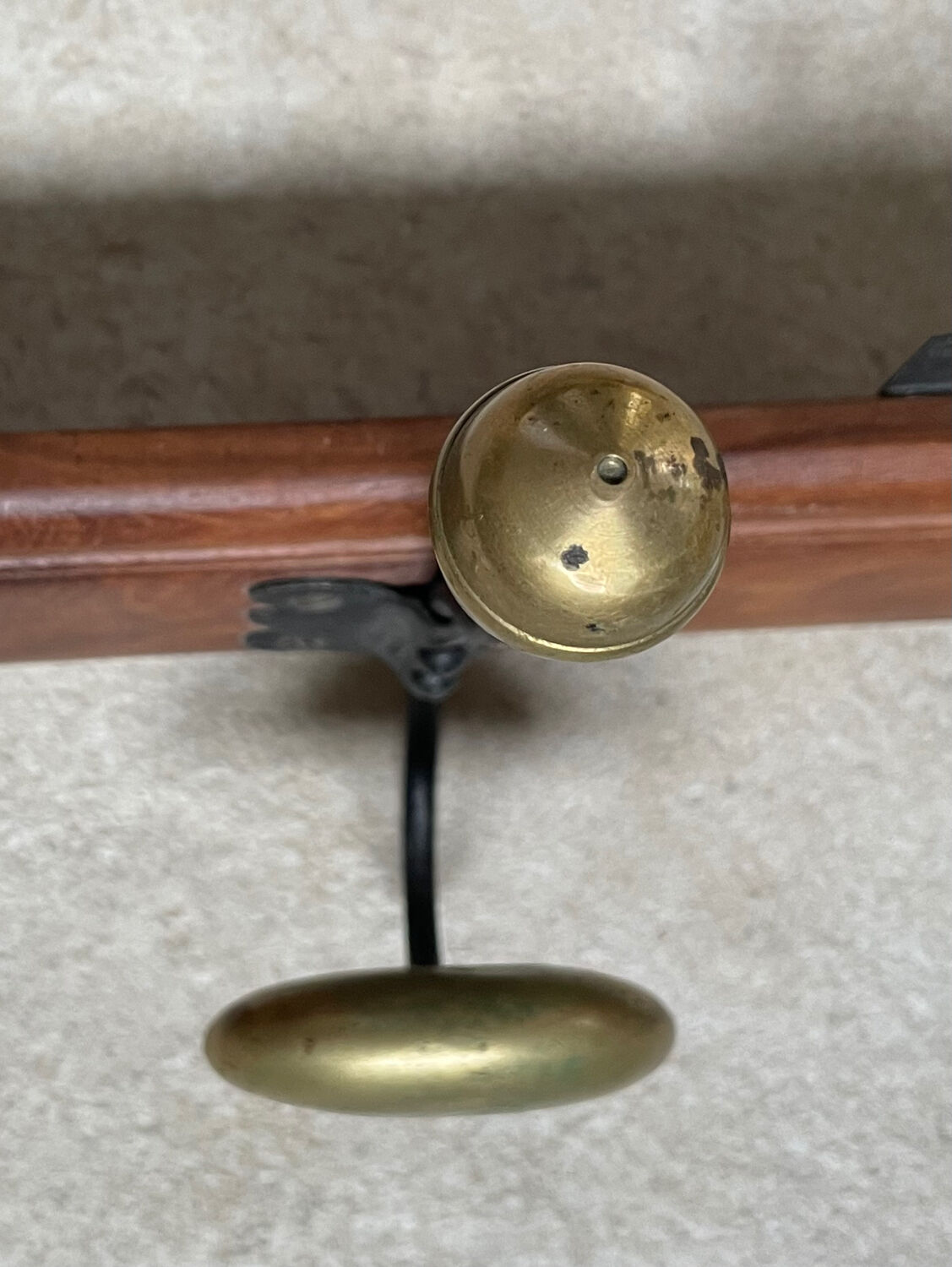 Wood and brass coat rack