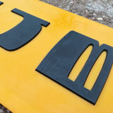 Old yellow "furniture" sign
