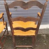 Pair of blackened wooden armchairs