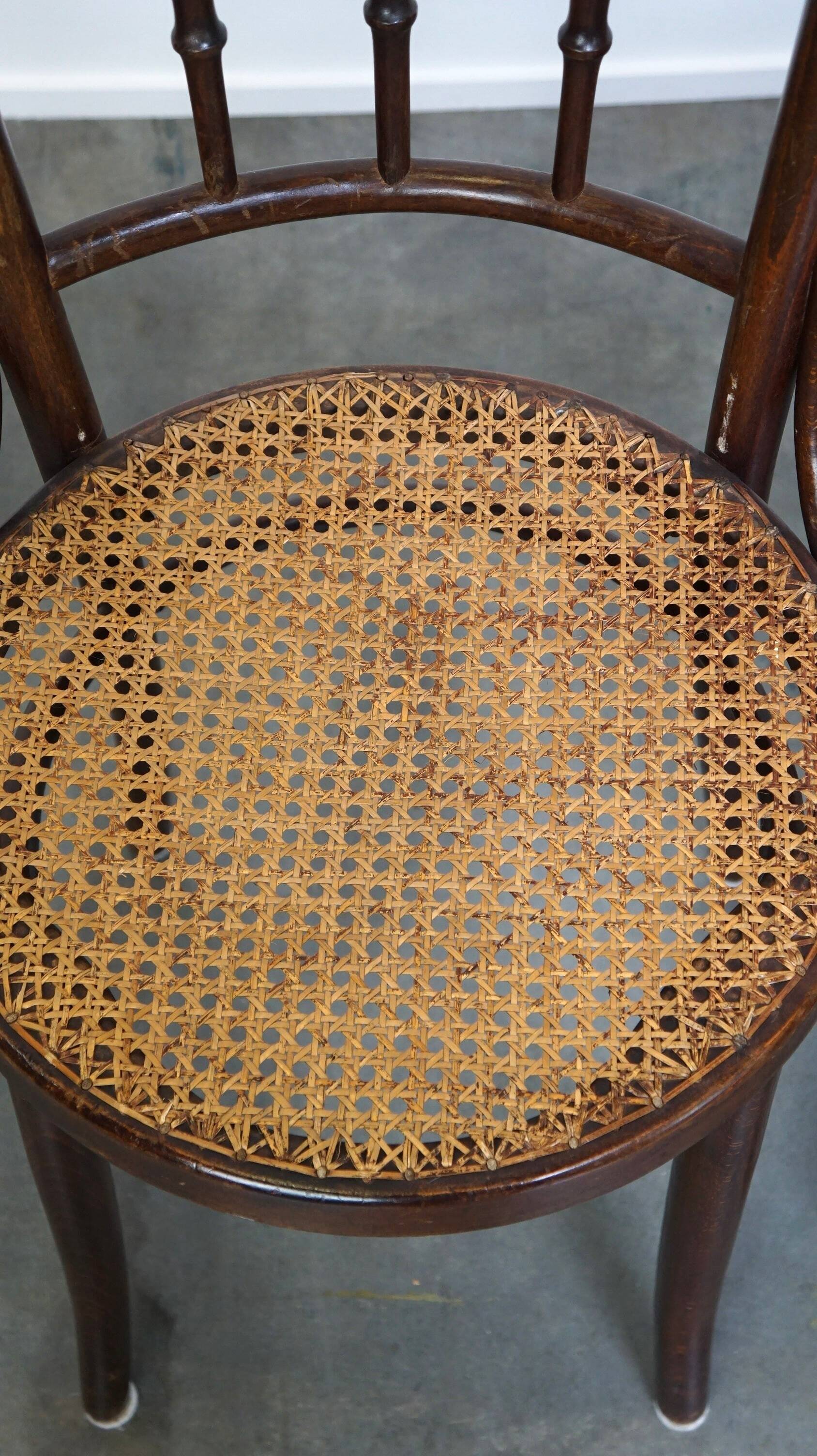 4 antique wooden and cane bistro chairs