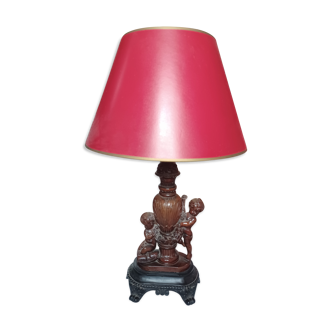 Table lamp on a piece of furniture cherub in very good condition